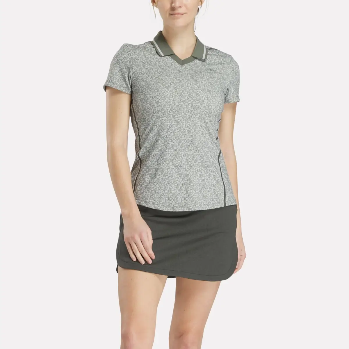 Damen-Poloshirt mit Flügelärmeln und Johnny-Kragen mit Mikroblümchenmuster