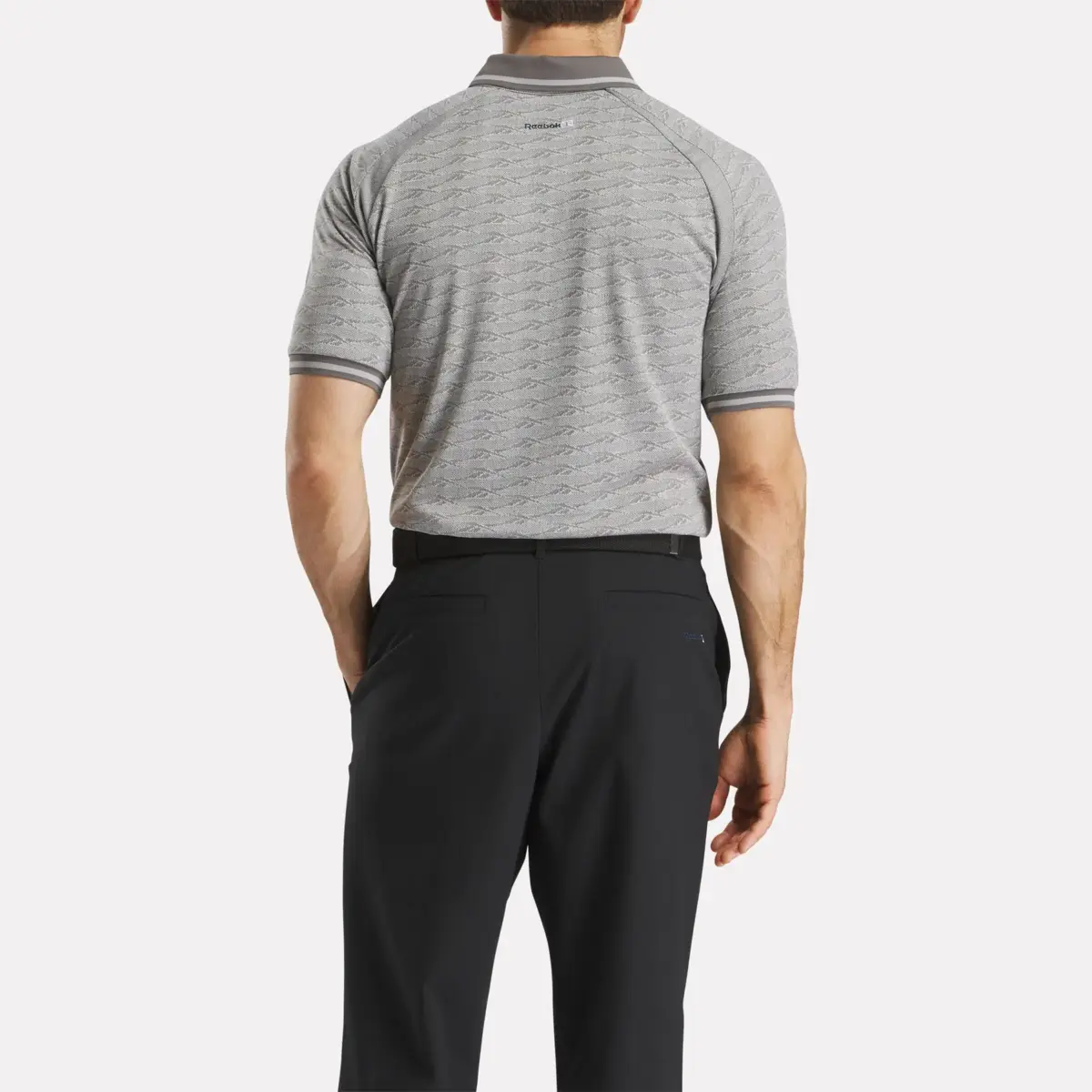 Herren-Poloshirt mit kurzen Ärmeln, tonalem Vector-Jacquard und geripptem Kragen Herren-Poloshirt mit kurzen Ärmeln, tonalem Vector-Jacquard und geripptem Kragen
