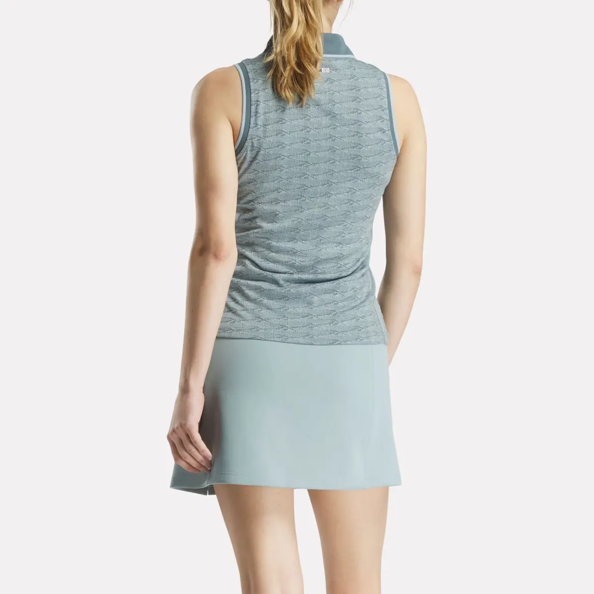 Ärmelloses Golf-Poloshirt für Damen mit tonalem Vector-Jacquard Ärmelloses Golf-Poloshirt für Damen mit tonalem Vector-Jacquard