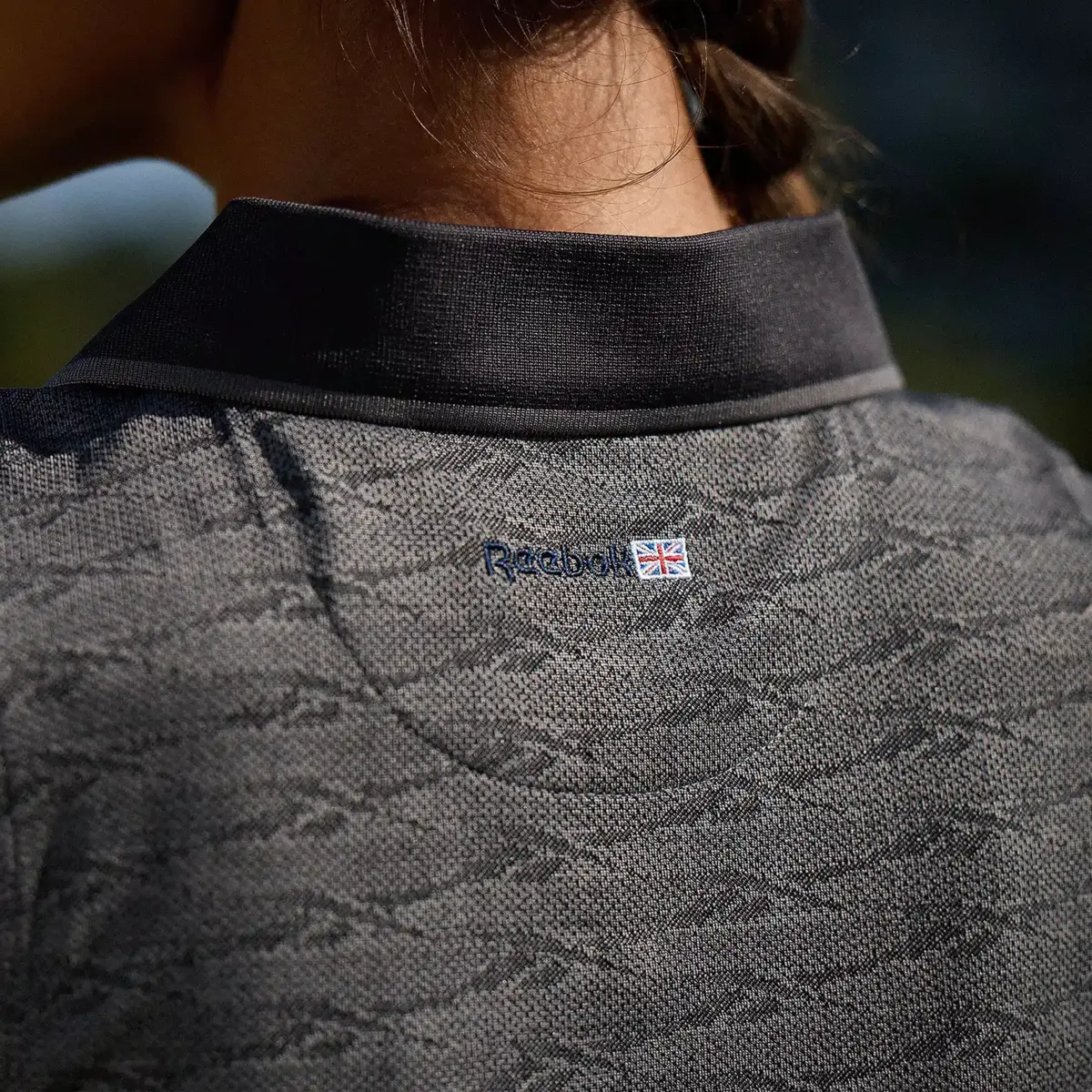 Ärmelloses Golf-Poloshirt für Damen mit tonalem Vector-Jacquard Ärmelloses Golf-Poloshirt für Damen mit tonalem Vector-Jacquard
